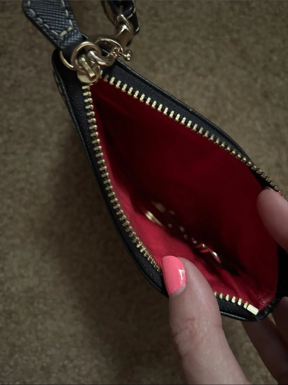 Dooney & Bourke compact wristlet